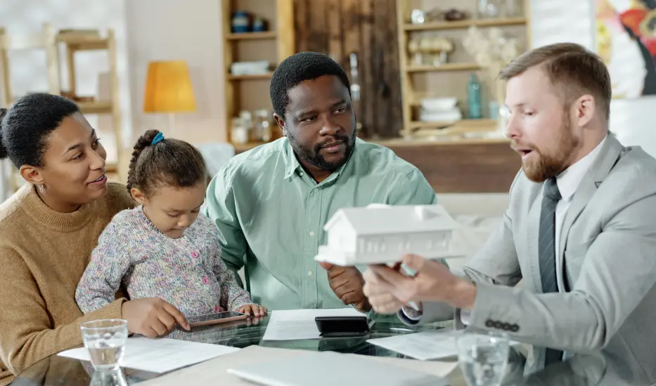 A family receiving mortgage advice.